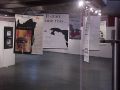 L'installation. Les affiches suspendues organisent et redéfinissent l'espace de présentation. - Décembre 2004
